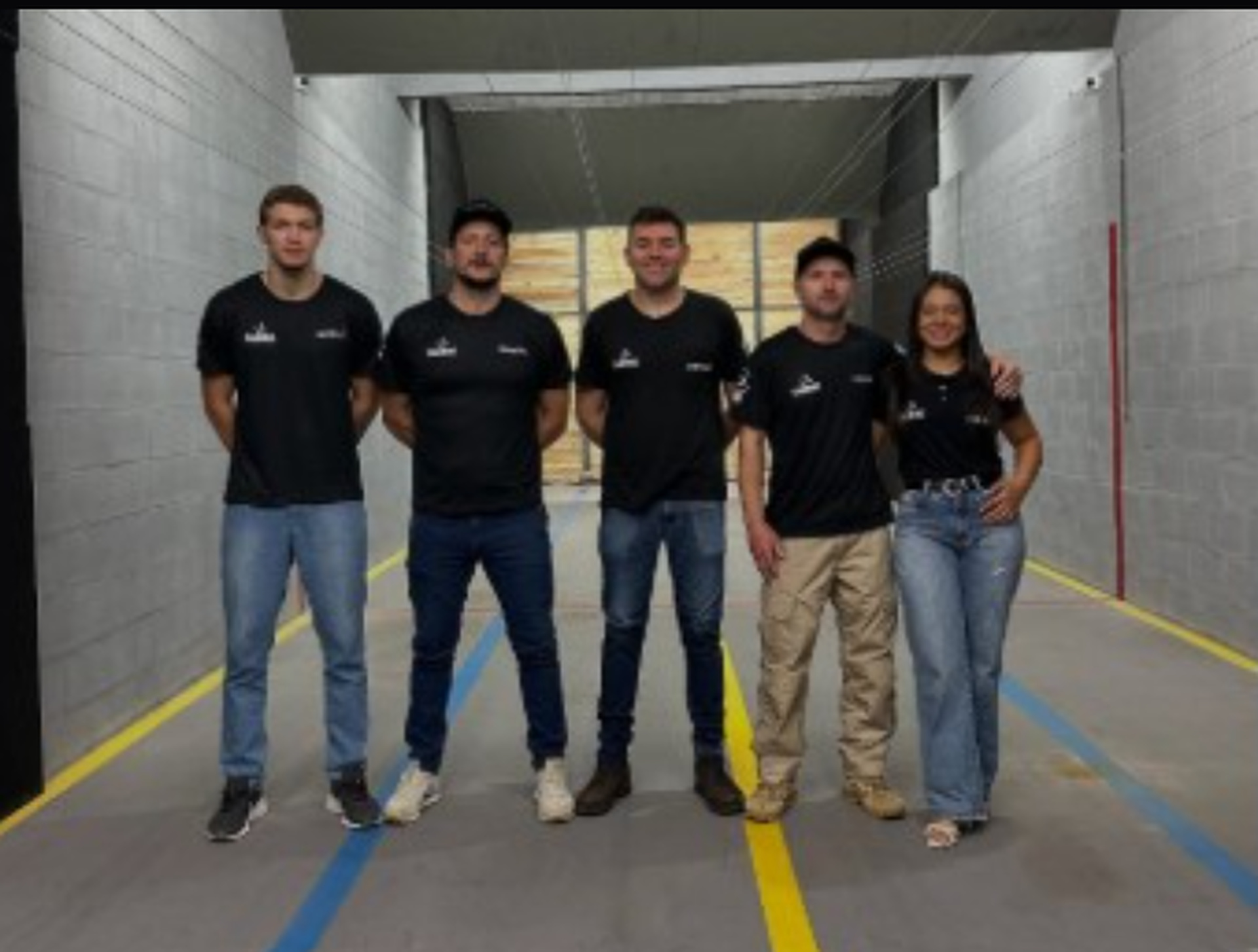 Equipe da Impacto Armas no estande de tiro